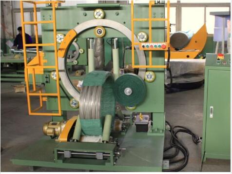 Steel wire and copper wire coiling and wrapping machine