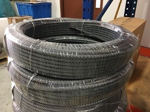 Coil wrapper making wire spools wrapped