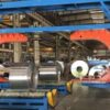 Coil master for wrapping deep steel and wire coils