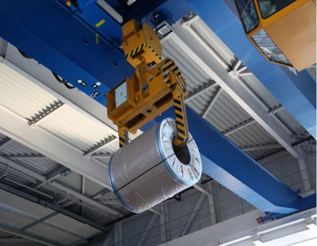 steel coils loading by hoist to packaging station